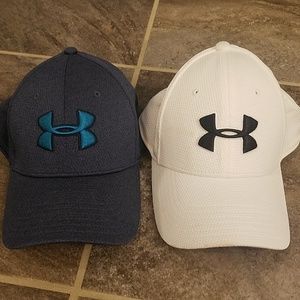 Under Armour hats. Maybe worn once or twice